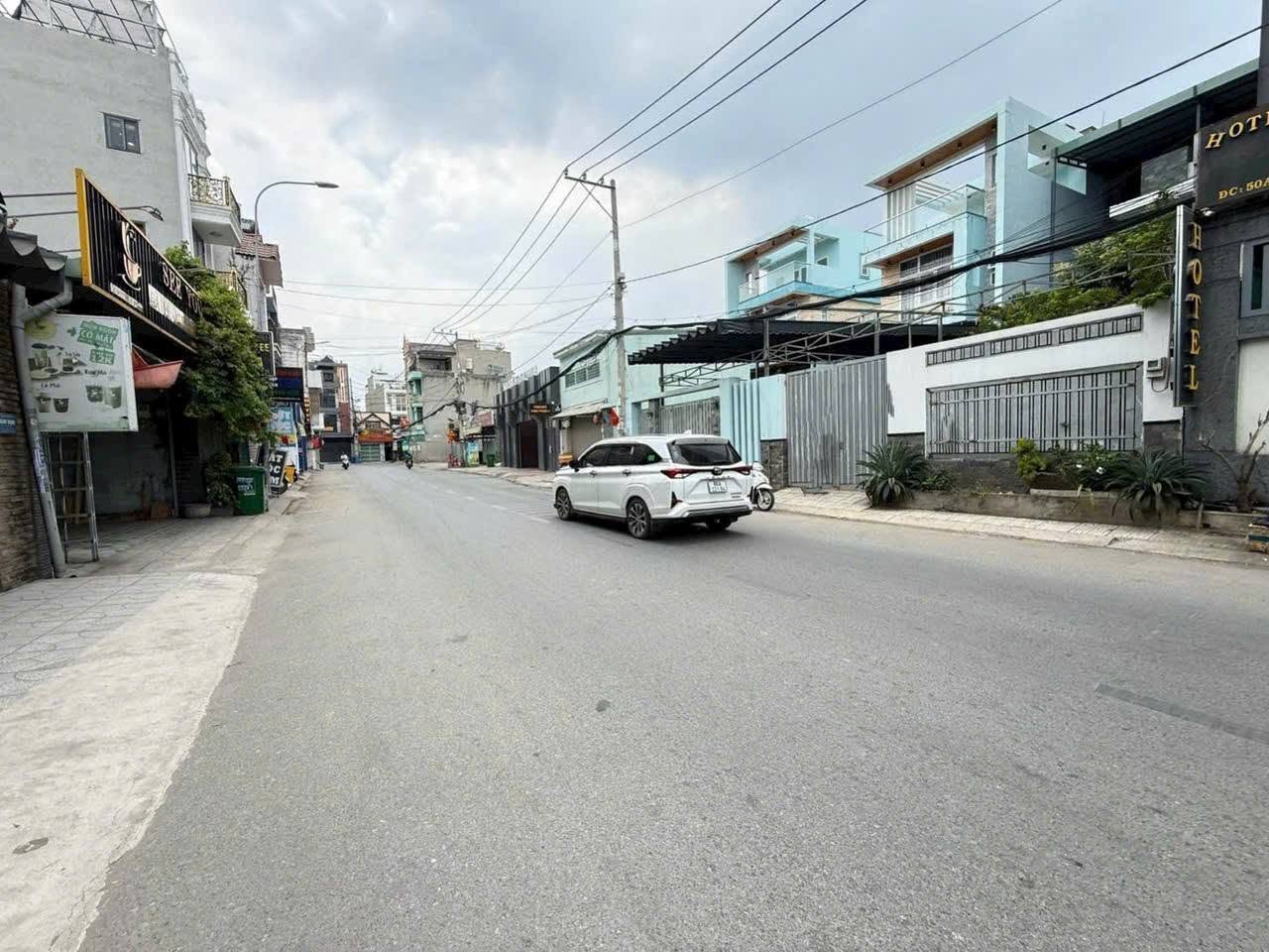 BIỆT THỰ MẶT TIỀN ĐƯỜNG 12M CÓ VỈA HÈ AN PHÚ ĐÔNG Q12 - NGANG 7.4MX30M - 3 TẦNG 4PN - GIÁ 22 TỶ